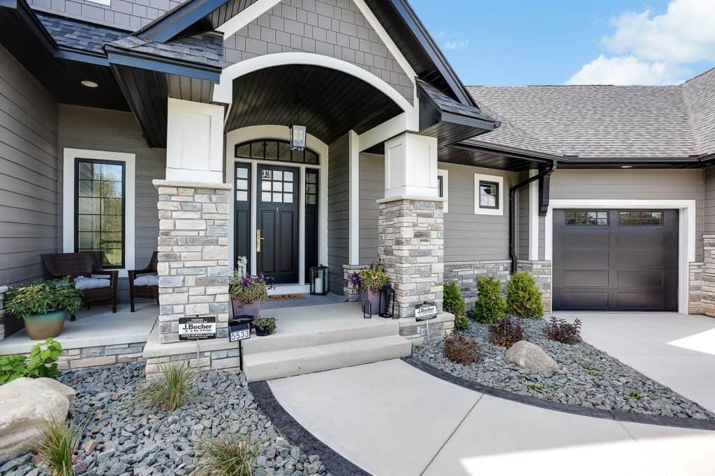 Elegant concrete porch and walkway with modern design, perfect for curb appeal.
