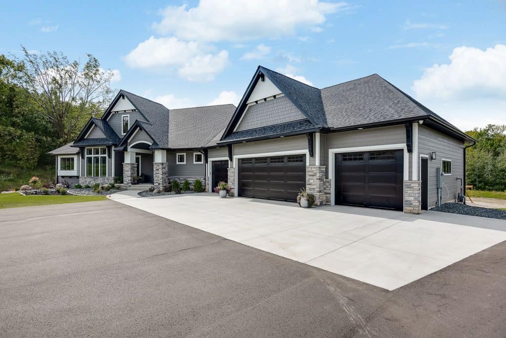 Elegant modern concrete driveway and garage with stylish house exterior, Project Gallery.
