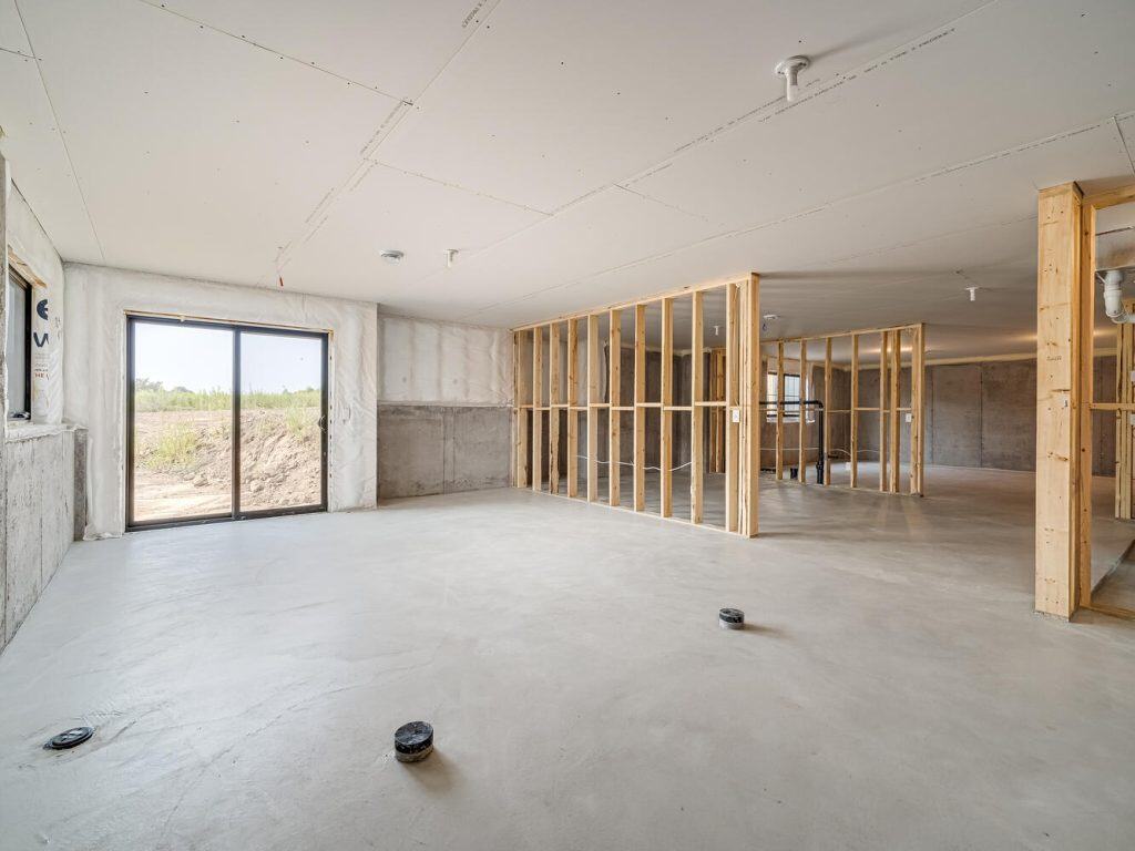Concrete interior layout with framing for a residential project at Project Gallery.
