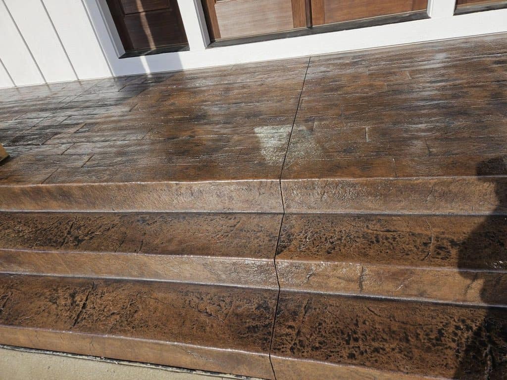Elegant stained concrete patio with textured finish and seamless design for outdoor living.